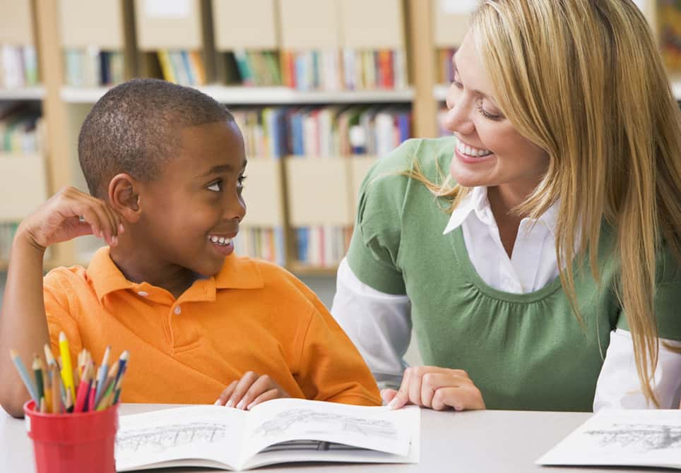 Student and Teach Smiling