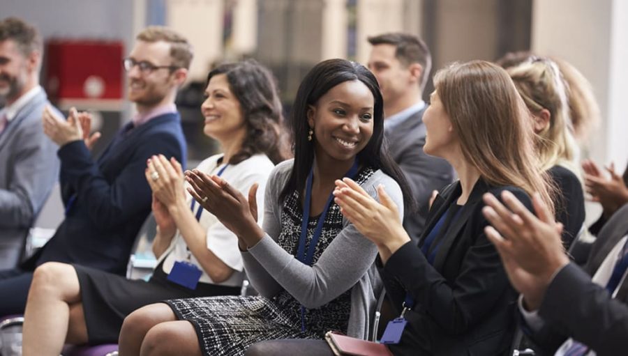 Audience clapping at professional learning education conferences in 2017 presentation from FETC