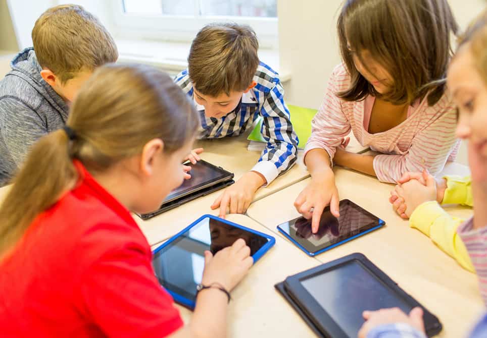 Kids reading on tablets