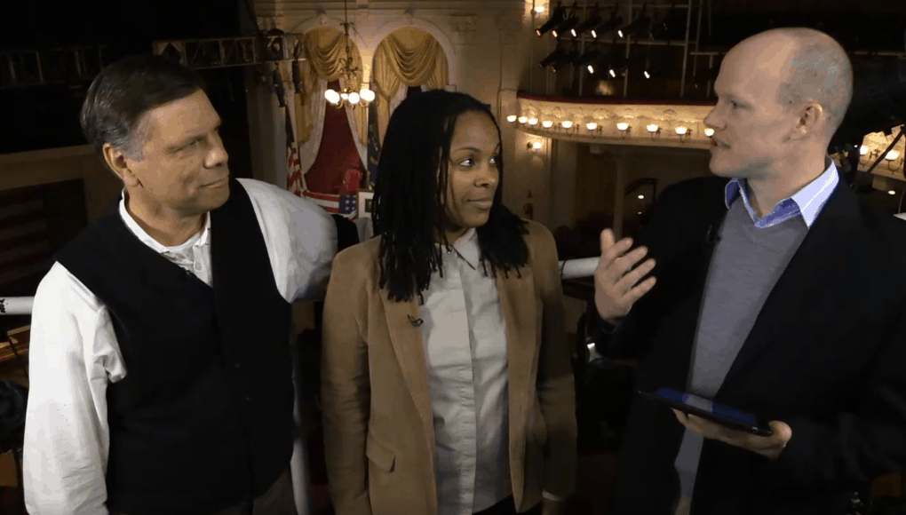 three people standing in the Ford theater, guiding one of our favorite virtual field trips