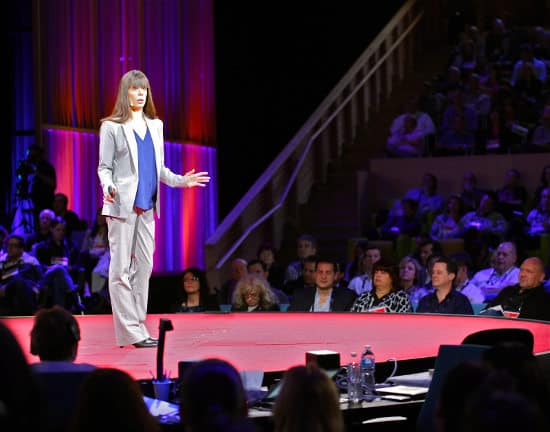 Woman on stage, one of the must-have classroom spaces for pbl