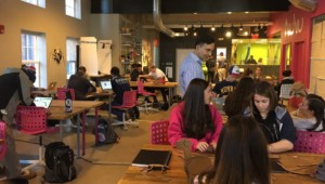 Students working on projects in nuvu's Studio-based learning laboratory, which resembles an open-air loft