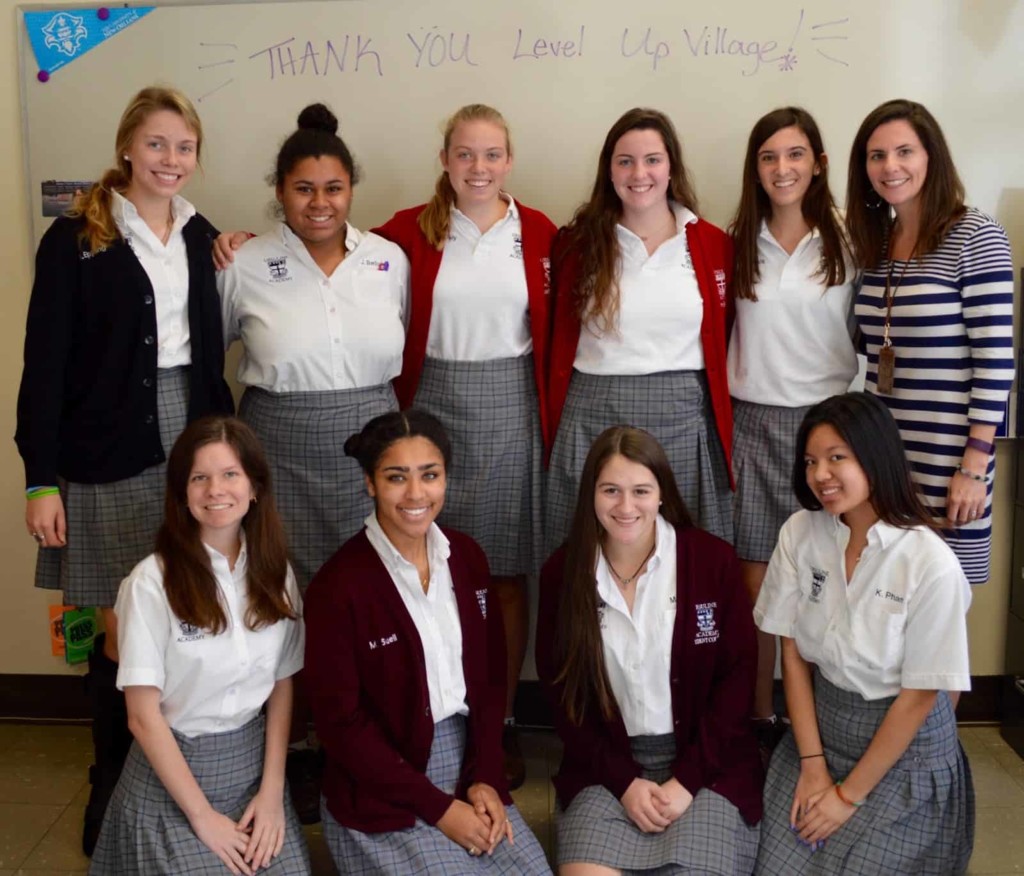 Students from the all-girls school smiling due to their involvment with STEM