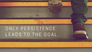 Feet climbing stairs with the text "only persistence leads to the goal", an illustation of what is required to encourage college persistence