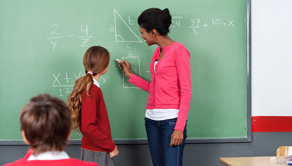 Teacher giving geometry math lesson Feature Image