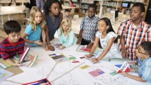 young student working in group