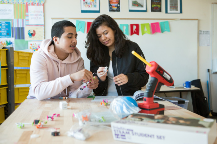 High schoolers at Capital City Public Charter School work together to assemble a circuit kit in the school’s makerspace.