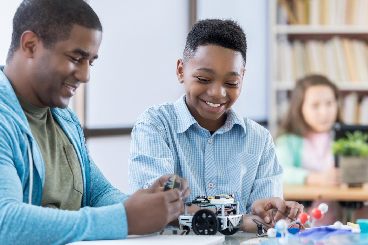 Boys making a robot