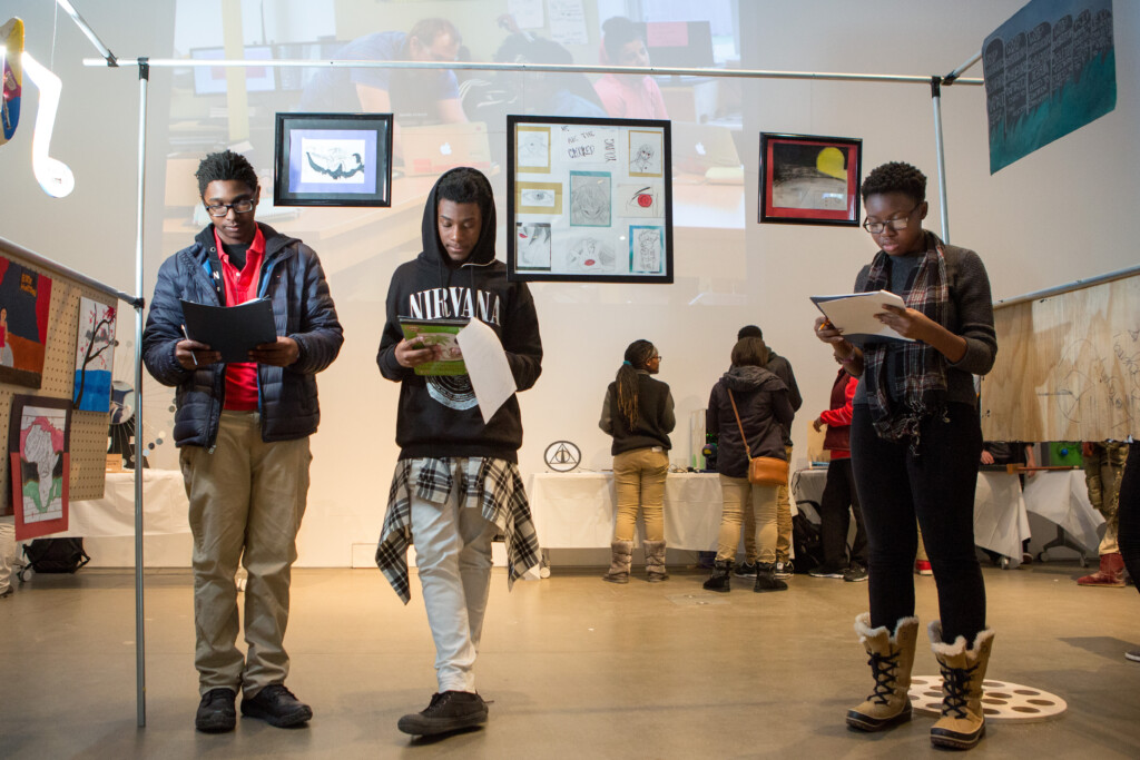 Students from MC2 STEM High School critique their classmates’ projects for an event that blends STEM and art.