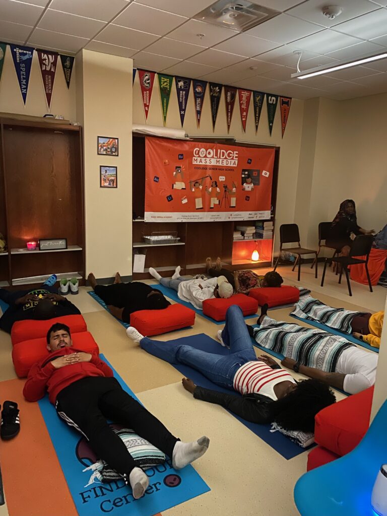 Members of Coolidge’s community participate in a guided meditation (photo courtesy of Kira Rowe)  