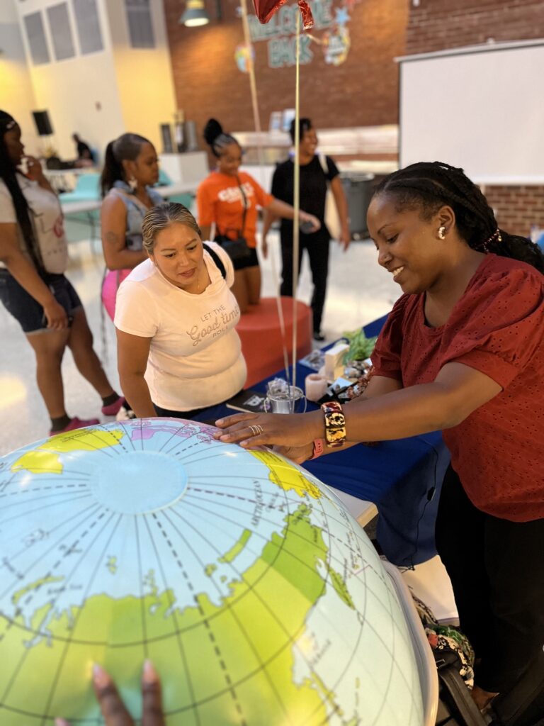 Coolidge family members engage with pillars of the Redesign model at the 2023 Back to School Night (photo courtesy of Kira Rowe) 