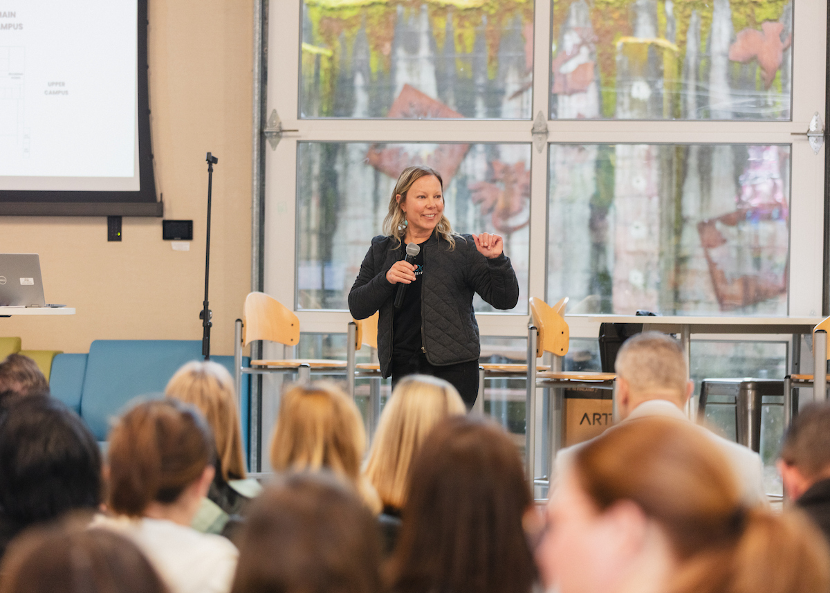 Julia Bamba speaking to a room of educators.